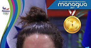 Eileen Grench con tercera medalla de oro