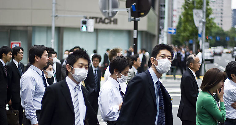 Personas con mascarillas